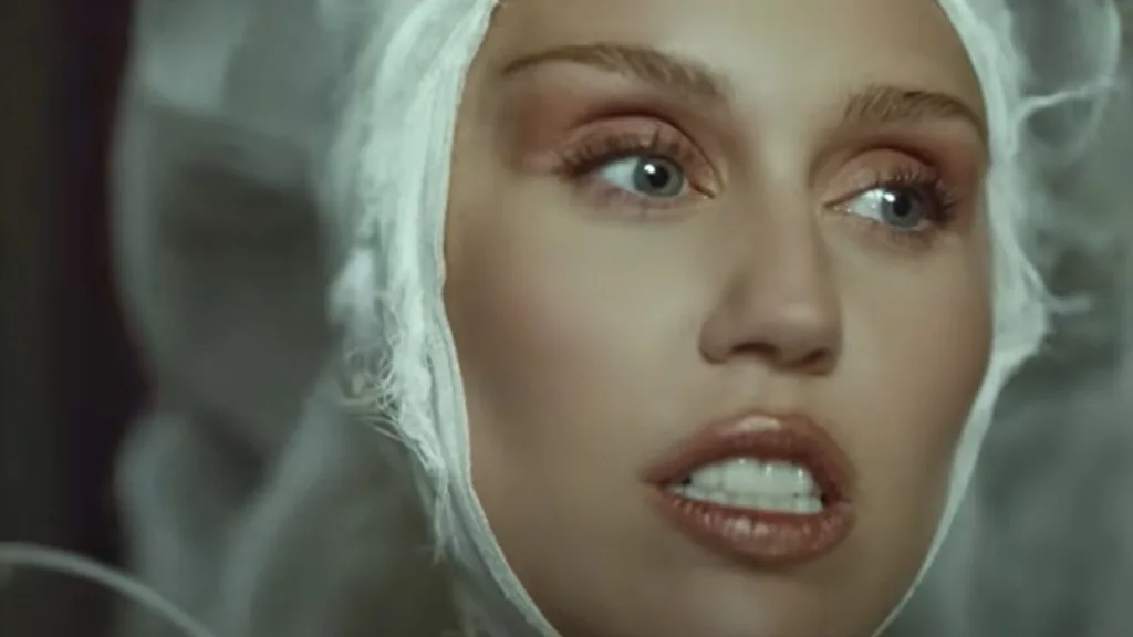 TRACK | Miley Cyrus Honors Her Dad + Musical Legends in “Secrets” Collab